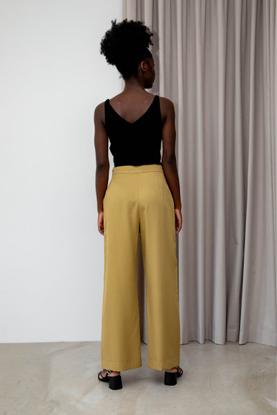 Sustainable Tencel Refibra wide leg pants back #color_amber-moss