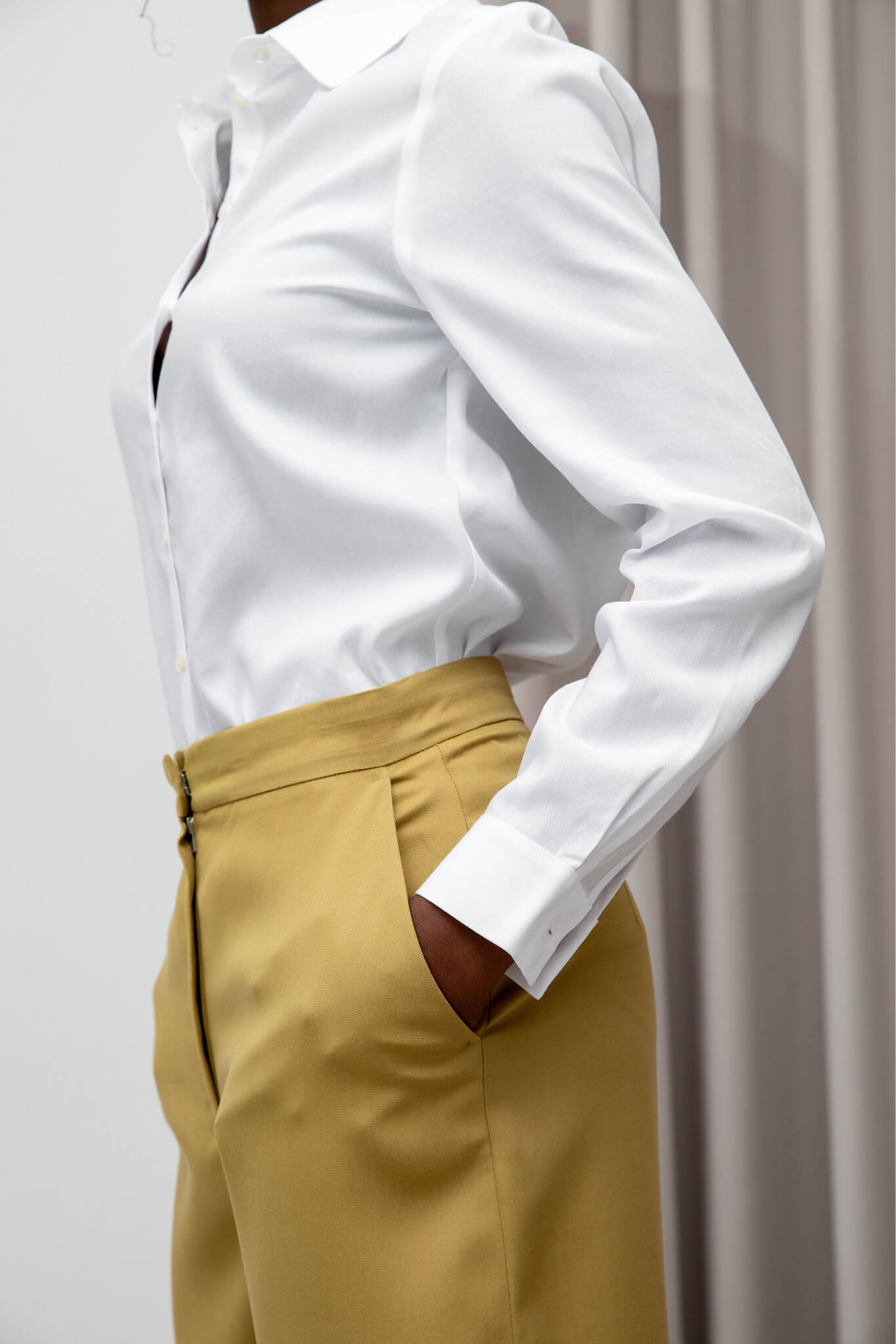 Sustainable Tencel Refibra wide leg pants fabric details #color_amber-moss