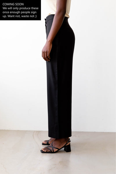 Sustainable Tencel Refibra wide leg pants black side #color_black