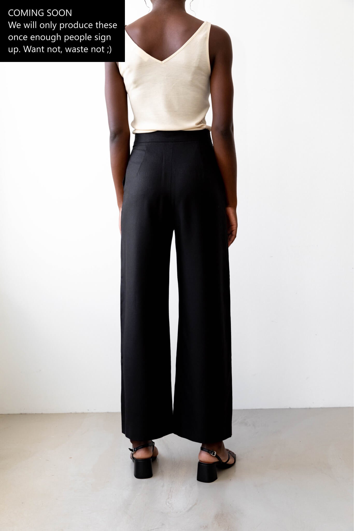 Sustainable Tencel Refibra wide leg pants black back #color_black