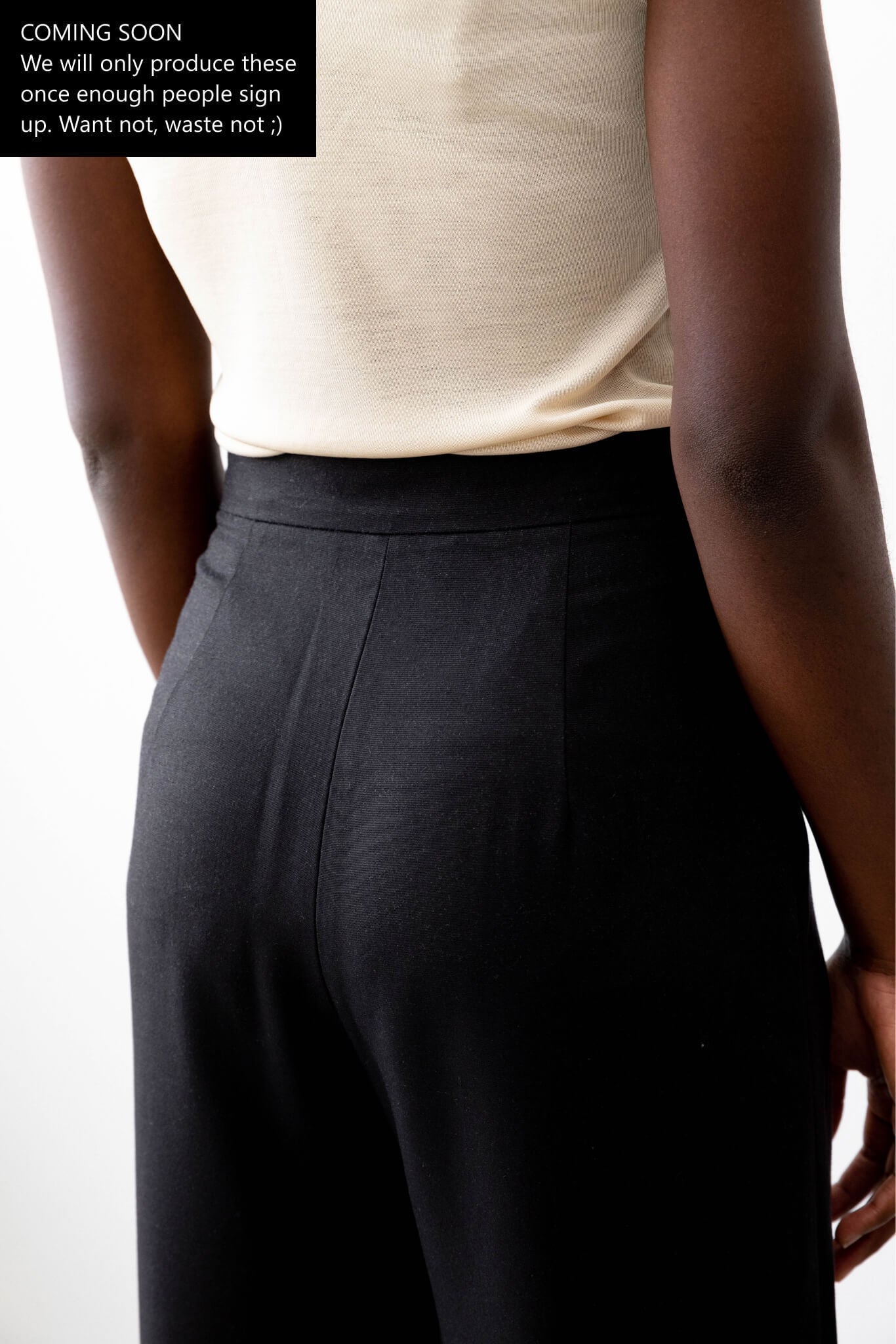 Sustainable Tencel Refibra wide leg pants black fabric details #color_black