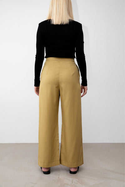 Sustainable Tencel Refibra wide leg pants back #color_amber-moss